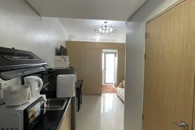 Image de A Cozy condo in a Prime location connected to Sm North Edsa Mall, Quezon City