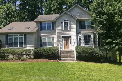 Image de Cozy Home in Private Beach Community Close to City