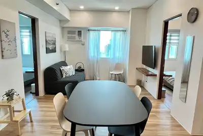 Image de Modern 2 Bedroom in Central Makati w/ Netflix Wi-Fi Pool!