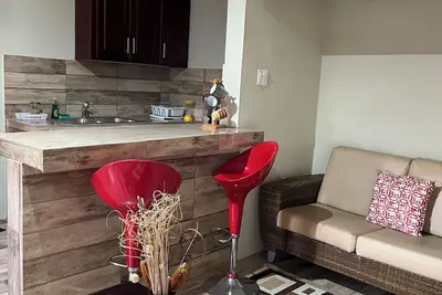 Image de Comfortable Self Contained Apartment, close to the Airport, beaches, shopping.