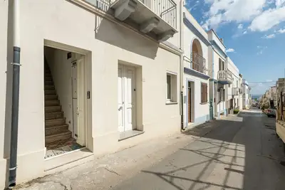 Image de Appartement 'Casa Vacanze Riflessi Sul Mare' avec balcon, Wi-Fi et climatisation