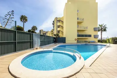 Image de Appartement 'Casa Cláudia - Cond Do Mar' avec vue sur la mer, piscine partagée et Wi-Fi