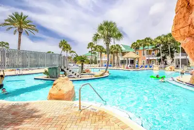 Image de It Takes A Village! A Purple Parrot Resort Village! Waterfall Pool, Anyone?
