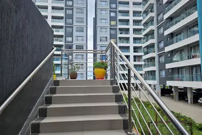 Image de Apt 1 - 2br Apartment with a pool, high-speed internet, close to the airport