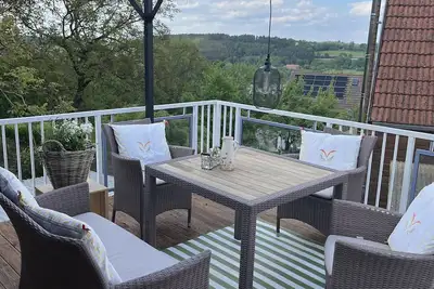 Image de Appartement 'Wohnung Mit Dachterasse' avec terrasse privée, jardin partagé et Wi-Fi