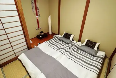 Image de Welcome to our guest house offering a traditional Japanese architectural style and stay experience.