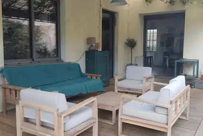 Image de Maison de ville avec terrasse couverte et grand jardin