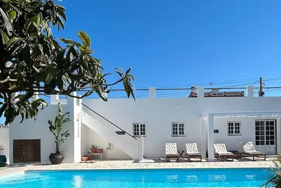 Image de Quinta 15 min de la plage(5 chambres et 15 couchages ) piscine