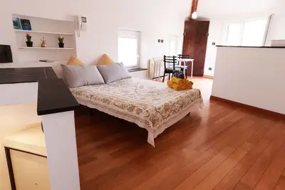 Cozy and bright penthouse with floor  terrace on the rooftops of the old town