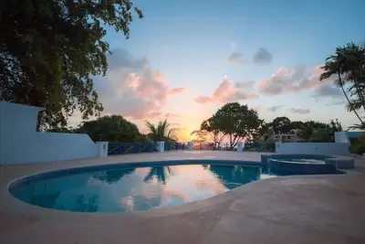 Image de Large deck with views of the Caribbean Sea! Super king beds in luxurious villa.