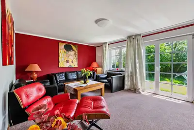 Image de Maison de vacances 'Austernfischer Haus Sonnenschein' avec terrasse partagée, jardin privé et Wi-Fi