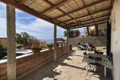 Image de Ginevra Apartment in Seccheto, with equipped porch with splendid sea view, close to the center and t