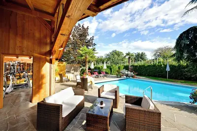 Image de Chalet '5 55m²' avec vue montagne, piscine partagée et Wi-Fi