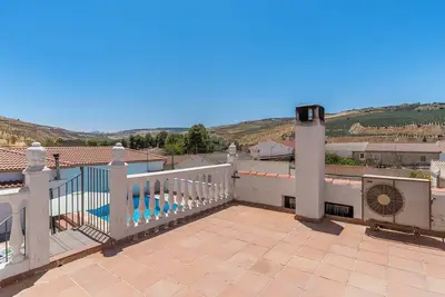 Image de Maison de vacances 'Casa Pepita' avec vue sur les montagnes, piscine privée et Wi-Fi
