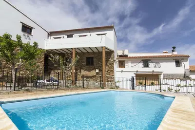 Image de Maison de vacances 'Casa Rural Padre Ramon' avec vue sur la montagne, piscine partagée et Wi-Fi