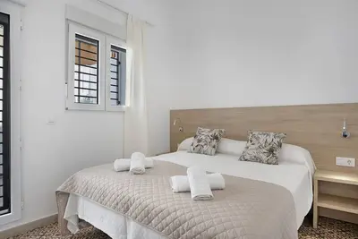 Image de Appartement 'Apartamento Guzmán C' avec terrasse privée, Wi-Fi et climatisation