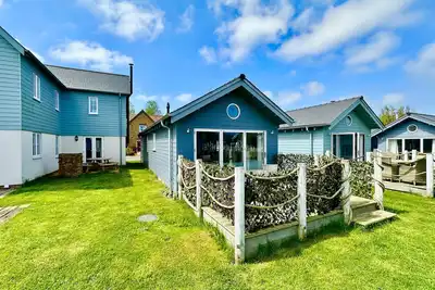 Stunning Coastal Beach House - Sleeping 4 in 2 Bedrooms - Pool and Beach Access Included.