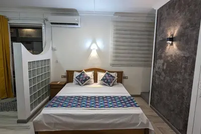 Image de Happy House - With beautiful pool & 1 minute walk to amazing Blue Bay beach