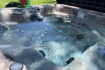 Image de Lakefront, luxury hot tub spa, firepit, kayak, paddleboard, Ev charger, boat dock