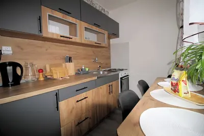 Image de Cosy apartment, free parking, hudge kids playground, peaceful area. Welcome;).
