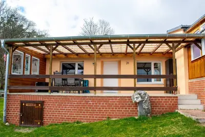 Image de Joli bungalow avec terrasse couverte
