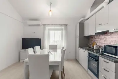 Image de Appartement de vacances avec jardin commun et terrasse