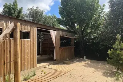 Image de Cabane Spa Premium 33m² (2 chambres) + terrasse couverte  + Tv + Lv + Plancha + Draps + Serviettes 4 à 5 personnes - 4 pers. inc