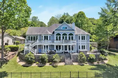 Image de Go Jump In the Lake! Just Listed Custom Lakefront Home with Dock & Amenities!