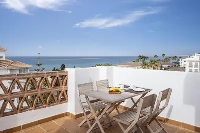 Image de Appartement 'Ático El Morche' avec vue sur la mer, Wi-Fi et climatisation