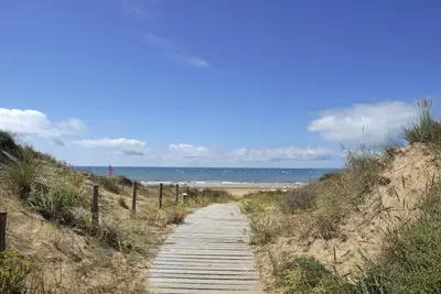 Image de Maison tout confort près de la plage, 5 pers, jardin privé, terrasse, Bbq, vélos et parking inclus