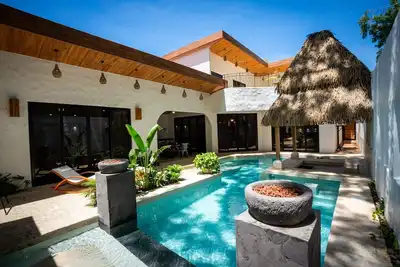Image de Bohemian Tropical Villa with a Tiki-Style Swimming Pool & Swim-Up Bar with an At