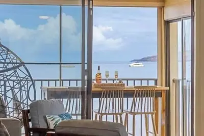 Image de Oceanfront, 2bedroom condo, Ac, 6 mile sandy beach