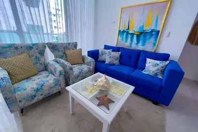 Image de A peaceful and cozy place  with an art of the state pool and near to the beach.