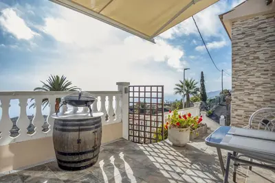 Image de Maison de vacances 'Las Golondrinas - A' avec vue sur la mer, terrasse privée et Wi-Fi