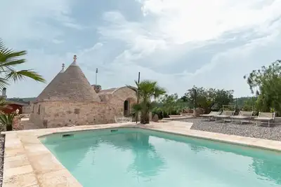 Image de Villa 'Trulli San Pietro' avec piscine privée, Wi-Fi et climatisation