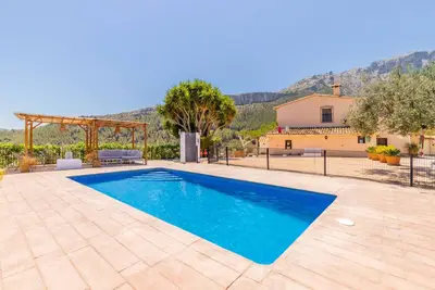 Image de Maison de vacances 'Casa La Lloma' avec vue sur les montagnes, piscine privée et Wi-Fi