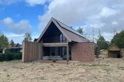 Image de Maison Neuve, 15 min de la Plage de St-idesbald. 8 Personnes. Terrasse Couverte