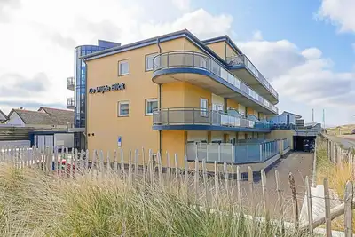 Image de Apartment de Wijde Blick 2. 07 in Callantsoog: Enjoy stunning views in a prime location. Just a few steps from the beach for an evening dive or a beach walk.