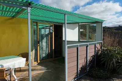 Kleines Ruhiges Duplex Ferienhaus mit Sonnenterasse, Garten und Liegeflaeche