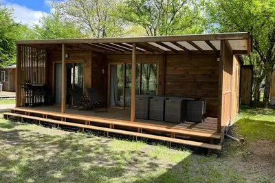 Image de Chalet Prestige 60 m² (3 chambres) dont terrasse couverte + Clim + Tv + Lv + Plancha 7 personnes