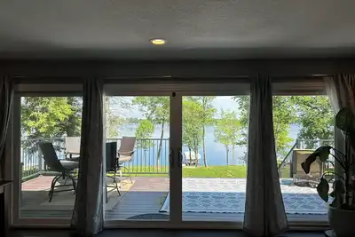 Image de Beautiful deck overlooking Maple Lake with private dock and pontoon for rent.