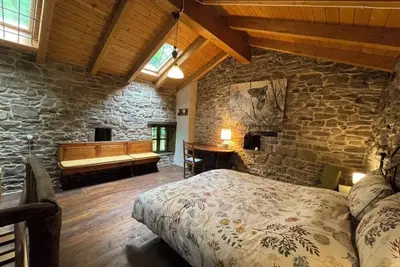 Image de The house in the woods, rustic stone cabin nestled in the chestnut forest