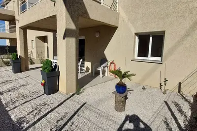 Image de Nouveau! F2 Neuf Avec Terrasse et Jardin à A Casetta, à 8 min de la Plage