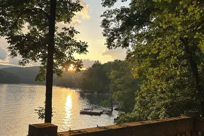 Image de Hickory Harbor lakefront w/ dock, grilling deck, and play yard on shady lot!