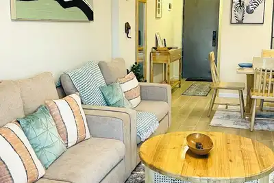 Image de 10 Mins Airport Salome Cosy Apartment with Pool & Gym