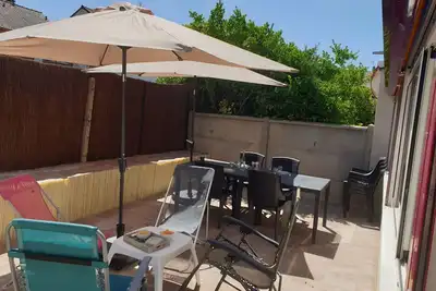 Image de A 200m de la Plage, 50m des Commerces, 30m2 de Terrasse Ensoleillée