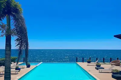 Image de Immerse yourself in the coastal serenity of our oceanfront apartment.