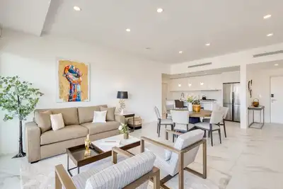 Image de Coastal condo with Wifi, private W/D, and rooftop patio