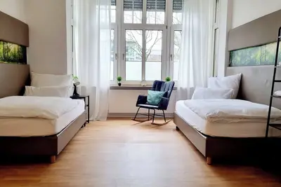 Image de 135m² Apartment I max. 8 guests I Central I Kitchen I Balcony I Parking I Wi-Fi