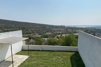 Image de Depto Amueblado Cocina Comedor 2camas Sala Jardín Asador Garage a 8min de Centro